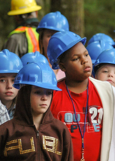 A group of students with blue hard hats